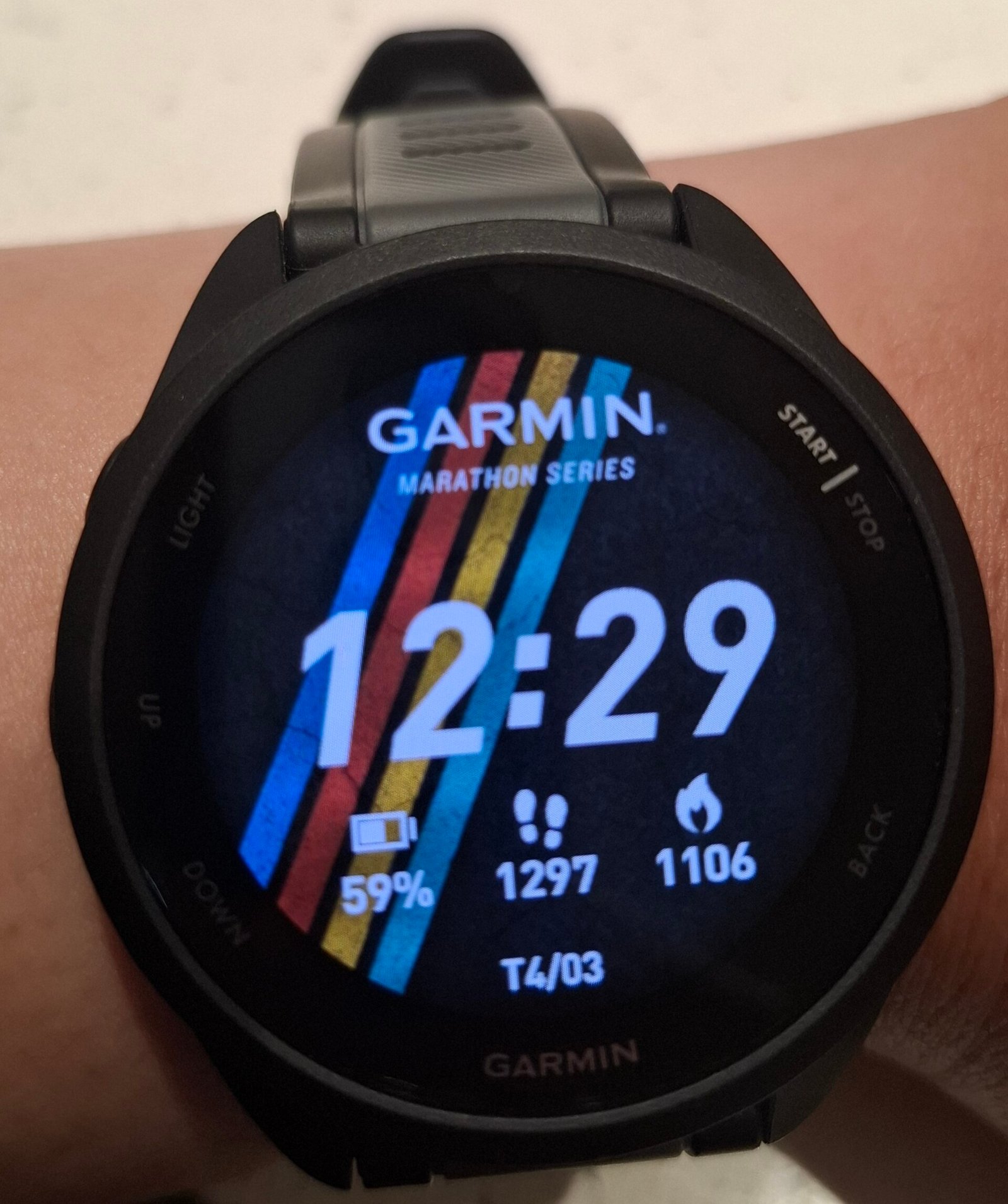 Garmin Forerunner 165 running watch on a wrist